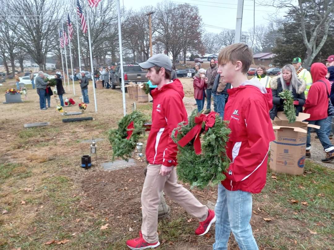 The West Plains Cross Country Team came out in full force to help<br>