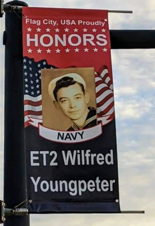 <i class="material-icons" data-template="memories-icon">stars</i><br/>Wilfred Youngpeter<br/>Posted by: Ann Fenimore<br/><div class='remember-wall-long-description'>Thank you for serving and for being an amazing role model for our family!</div><a class='btn btn-primary btn-sm mt-2 remember-wall-toggle-long-description' onclick='initRememberWallToggleLongDescriptionBtn(this)'>Learn more</a>