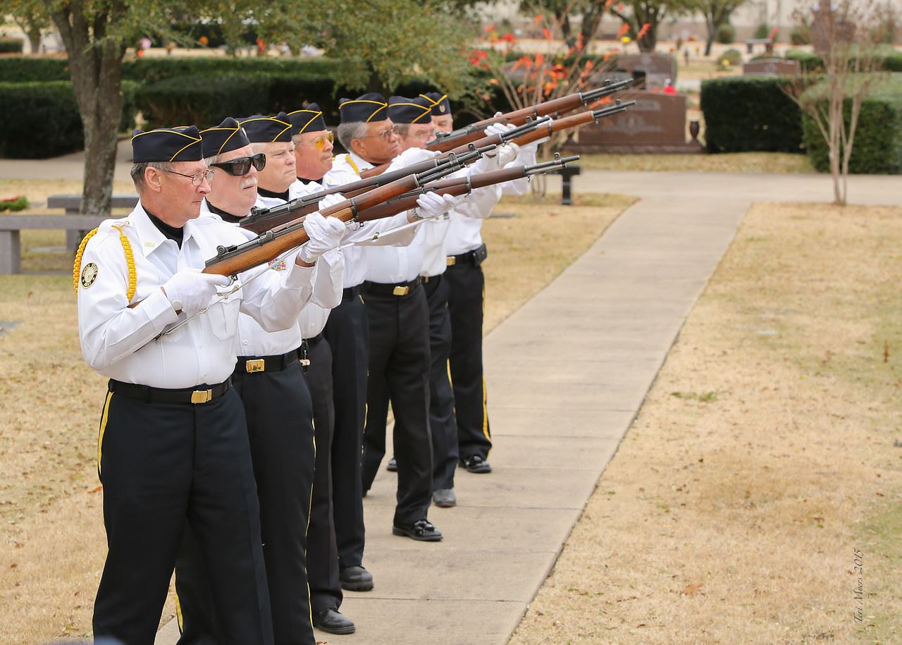 Hunt County Honor Guard prepares for a rifle volley following the laying of the final wreath.

Photo credit: Teri Myers