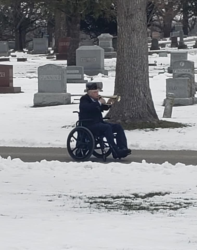 Past Natl. SAL Commander Randy Freel plays taps