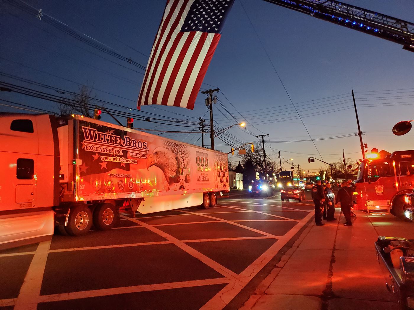 Convoy passes Fire House