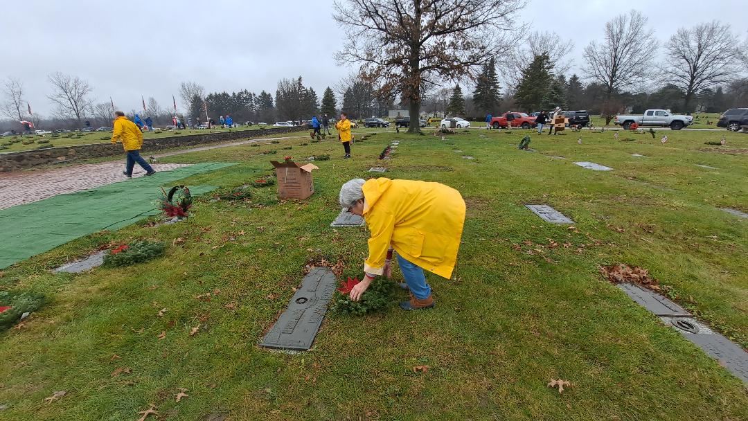 Nathan Perry Chapter, NSDAR Regent Robbie Brown placing a wreath at Resthaven Memory Gardens.