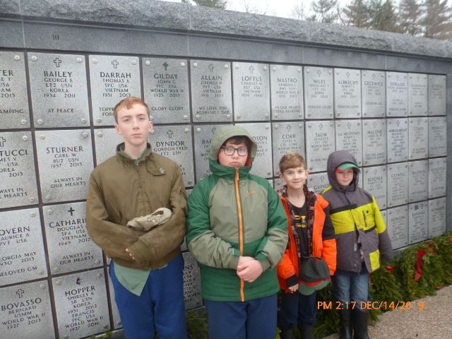 Several Trailmen honor the fallen at the memory wall in Saratoga National Cemetery in Dec2019.