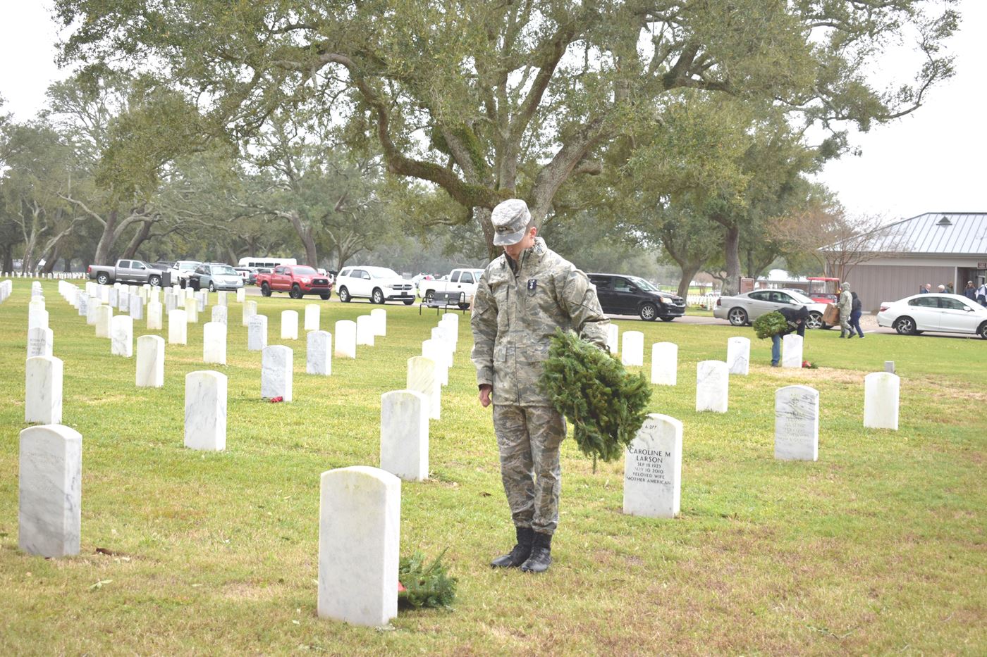 A solemn moment as cadets and volunteers lay wreaths to honor the fallen, despite the rain. Their dedication shows the true spirit of Wreaths Across America.