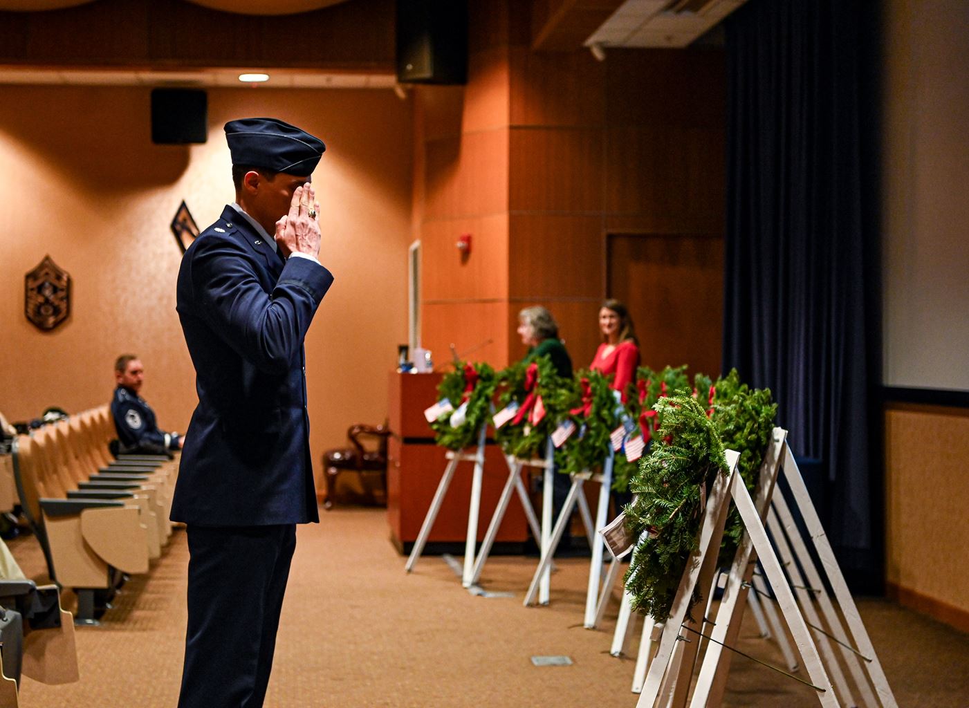 Maj Daniel Trapani places a wreath in honor of the 22 veterans and active-duty service members who daily lose their personal struggles with the invisible wounds of war.&nbsp;