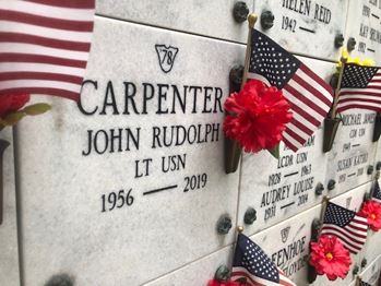<i class="material-icons" data-template="memories-icon">account_balance</i><br/>John Rudolph Carpenter, Navy<br/><div class='remember-wall-long-description'>Lt John Rudolph Carpenter. Merry Christmas in Heaven Jack. Beloved son, brother, father, uncle and friend. Hug dad for all of us and know how very much you are loved and missed every day. 

John (Jack) Rudolph Carpenter died on April 4, 2019 at his home in Annapolis, Maryland surrounded by his loving family.

John was born on August 19, 1956 at Brooke Army Medical Hospital at Fort Sam Houston in San Antonio, TX to then 2nd Lieutenant and Mrs. John A. Carpenter. As the son of a career USAF officer, he spent his youth living in Texas, Hawaii, New Jersey, Arizona, California, and Virginia. John was an Eagle Scout and was always adventurous – he loved spending time outdoors in the wilderness and was a member of the Varsity Water Polo and Varsity Swimming teams in high school.

Always happiest when near the sea or sailing open waters, John was honored to be selected as a midshipman and entered the Naval Academy in the summer of 1974. He was a proud member of the USNA Class of 1978 – 29th Company.

Following graduation with a Bachelor of Science in Physical Oceanography, John reported to Turner Joy (DD-951), where he was anti-submarine warfare officer, combat information center officer, naval gunfire support officer and ship intelligence officer; and was a plankowner of Ticonderoga (CG-47), where he was main propulsion assistant/engineer. His decorations include the National Defense Medal, Sharpshooter Ribbon and Surface Warfare insignia.

Following his Navy career, John joined Raytheon in Portsmouth, RI as a Systems Engineer where he oversaw development of MK-48 Advanced Capability (AdCap) torpedo software for submarine fired torpedoes. After Raytheon, John served 10 years in the U.S. Merchant Marines with a U.S. Coast Guard Merchant Marine License – Second Mate Unlimited Tonnage; All oceans/Captain of 1600 ton. 

John founded two Veteran-owned small businesses that are still in operation: Maine Labpack Inc. (1997) and MLi Environmental (2005) both specializing in hazard</div><a class='btn btn-primary btn-sm mt-2 remember-wall-toggle-long-description' onclick='initRememberWallToggleLongDescriptionBtn(this)'>Learn more</a>
