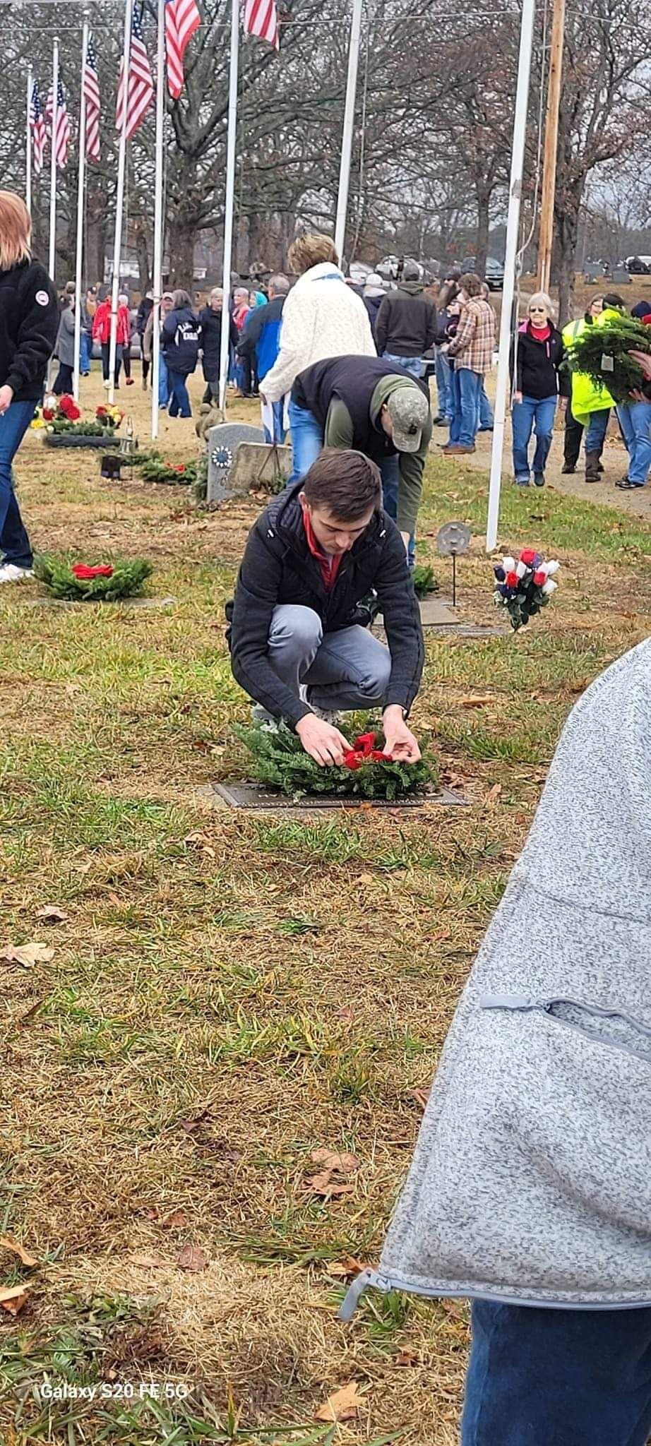 Each volunteer took time to make sure the wreath was placed just perfect and said the name of the veteran who's grave they were playing it on Remember - Honor - Teach in all that we do.<br>