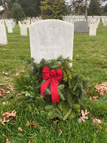 <i class="material-icons" data-template="memories-icon">account_balance</i><br/>Robert Michael Riggie, Army<br/><div class='remember-wall-long-description'>Miss on Your 1st Christmas in Arlington
Love Forever
Your Sister & Brothers</div><a class='btn btn-primary btn-sm mt-2 remember-wall-toggle-long-description' onclick='initRememberWallToggleLongDescriptionBtn(this)'>Learn more</a>