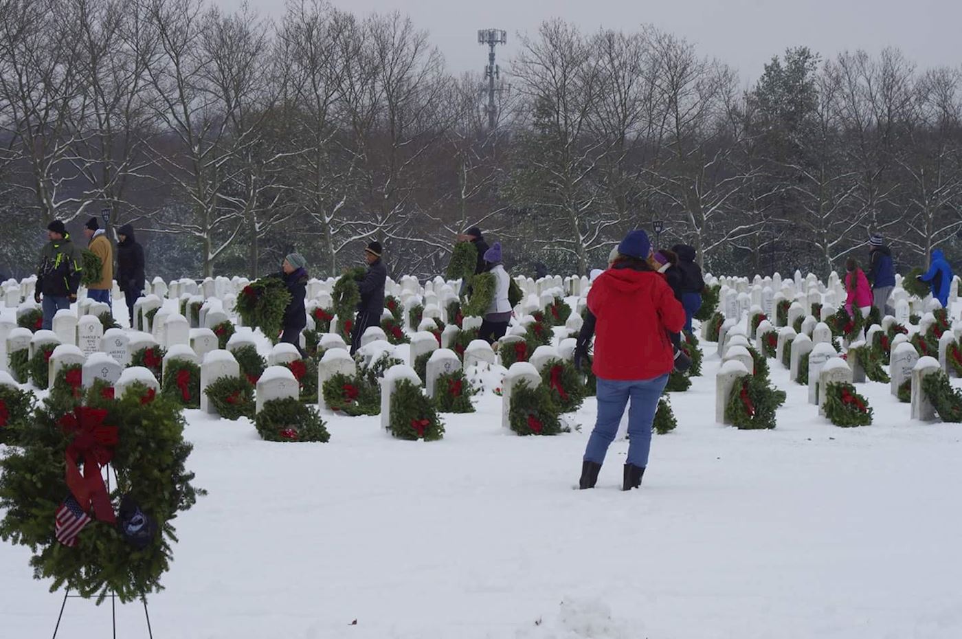 Volunteers placing wreaths  at the State Veterans Cemetery in Middletown on national Wreaths Across America Day December 17, 2016