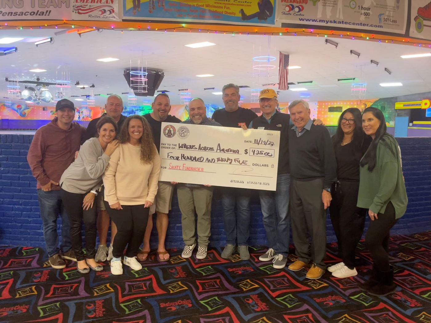 2023 Krewe of Priscus fundraising check presentation @ Skaters Choice