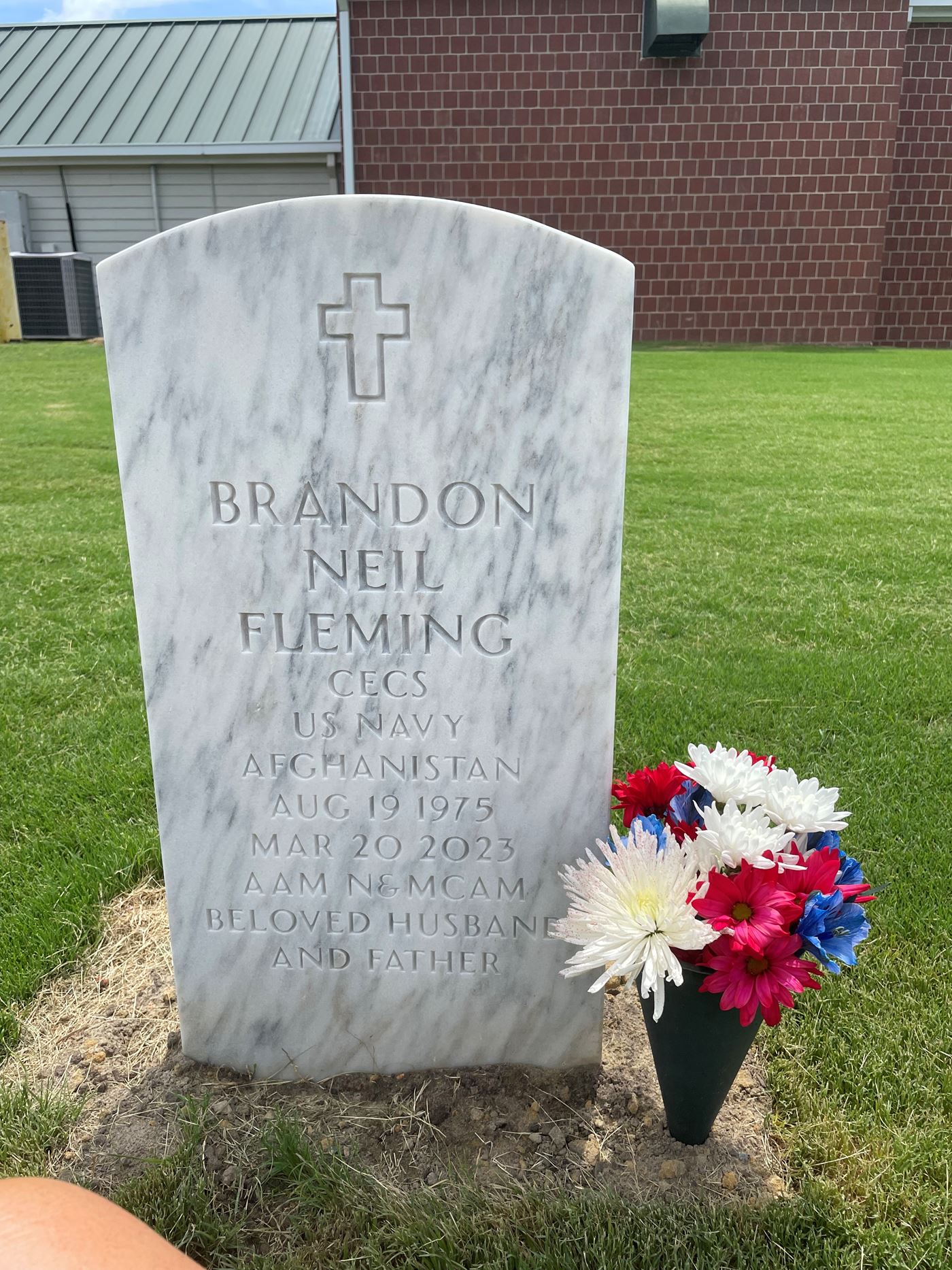 <i class="material-icons" data-template="memories-icon">account_balance</i><br/>Brandon Neil Fleming , Navy<br/><div class='remember-wall-long-description'>
  We love and miss you!</div><a class='btn btn-primary btn-sm mt-2 remember-wall-toggle-long-description' onclick='initRememberWallToggleLongDescriptionBtn(this)'>Learn more</a>