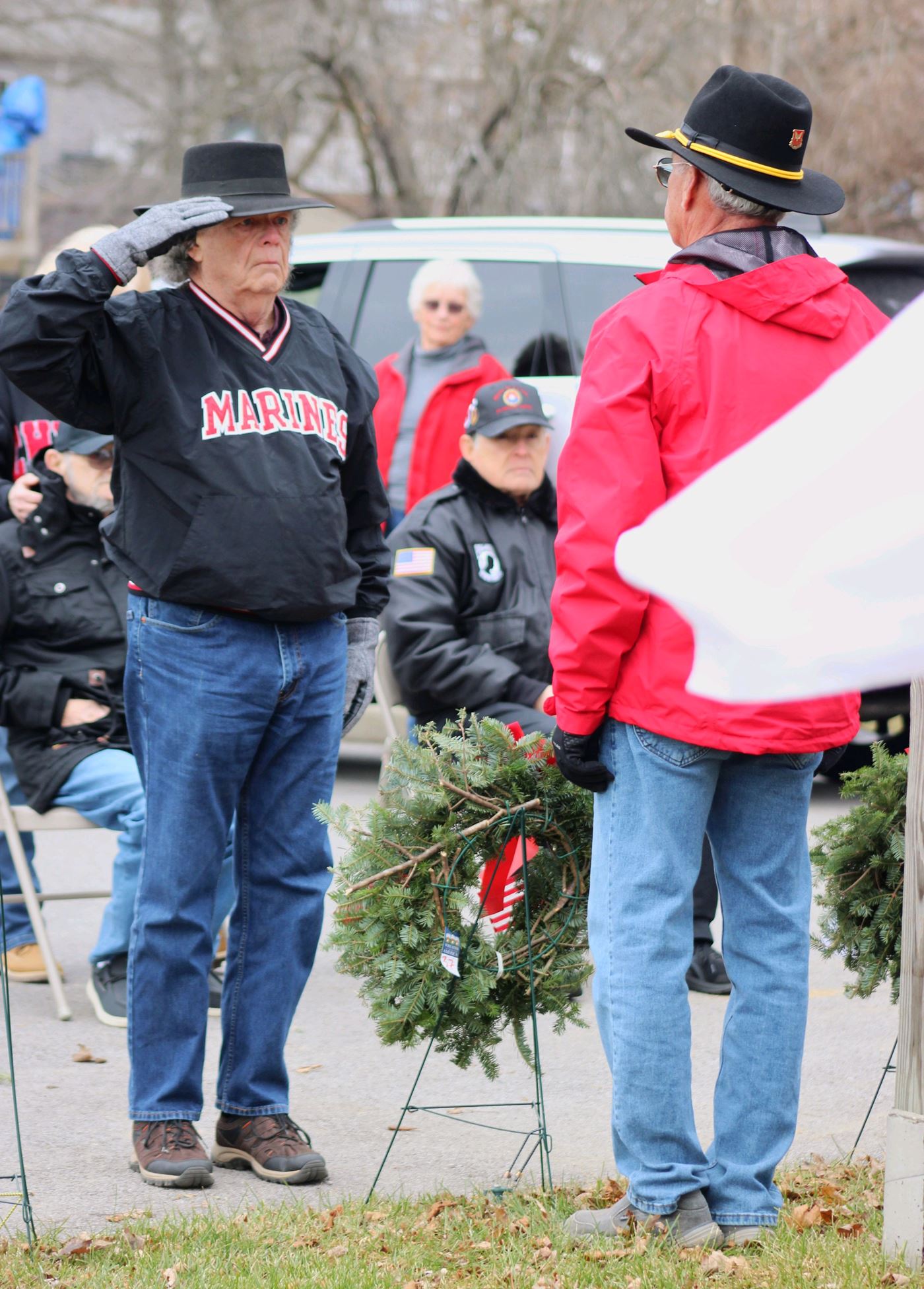 Barry Yeakle, Marine Corp Veteran and Purple Heart, Salutes Gary Bird Army Veteran and local Coordinator <br>