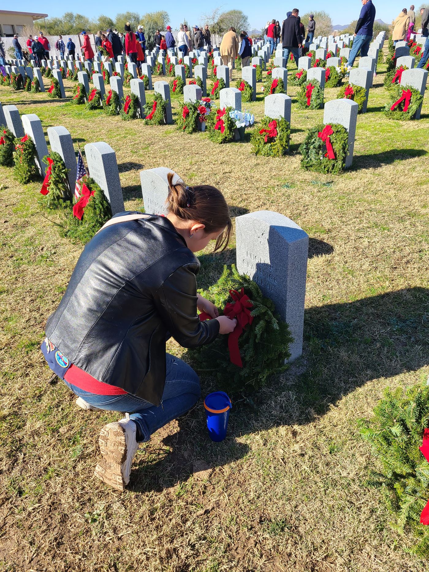 AHG member lays wreath and pays her respects to the individual who served our country.