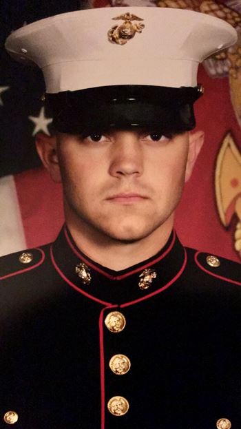 <i class="material-icons" data-template="memories-icon">stars</i><br/>Nickolas Armstrong, Marine Corps<br/><div class='remember-wall-long-description'>Nickolas Armstrong, we Love and Miss you everyday.</div><a class='btn btn-primary btn-sm mt-2 remember-wall-toggle-long-description' onclick='initRememberWallToggleLongDescriptionBtn(this)'>Learn more</a>