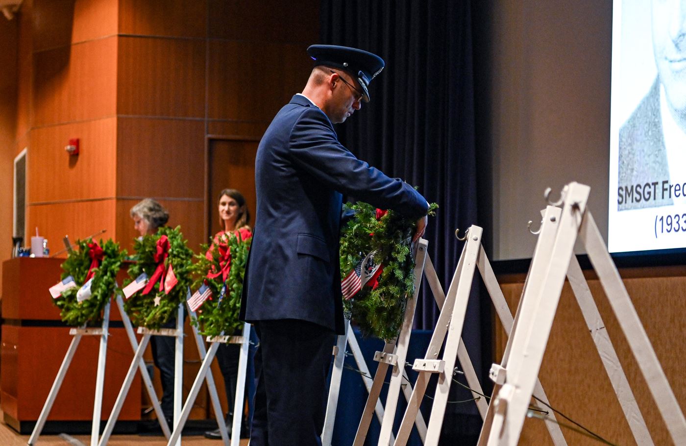 Maj Jeff Cumber places the veteran's wreath for those who have served and are serving in the United States Coast Guard&nbsp;