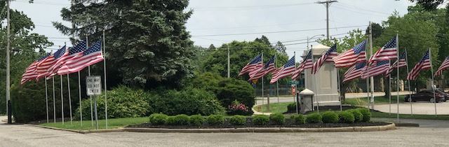 The flags adorning the front entrance to the park