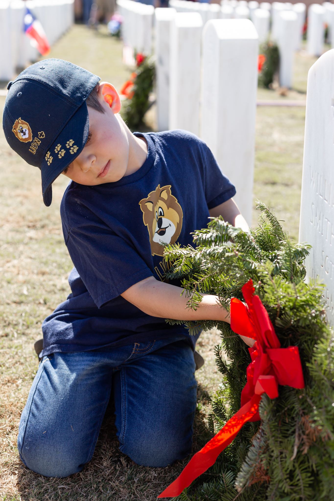 Our Lion Cub Scout helping lay wreaths in 2019.
