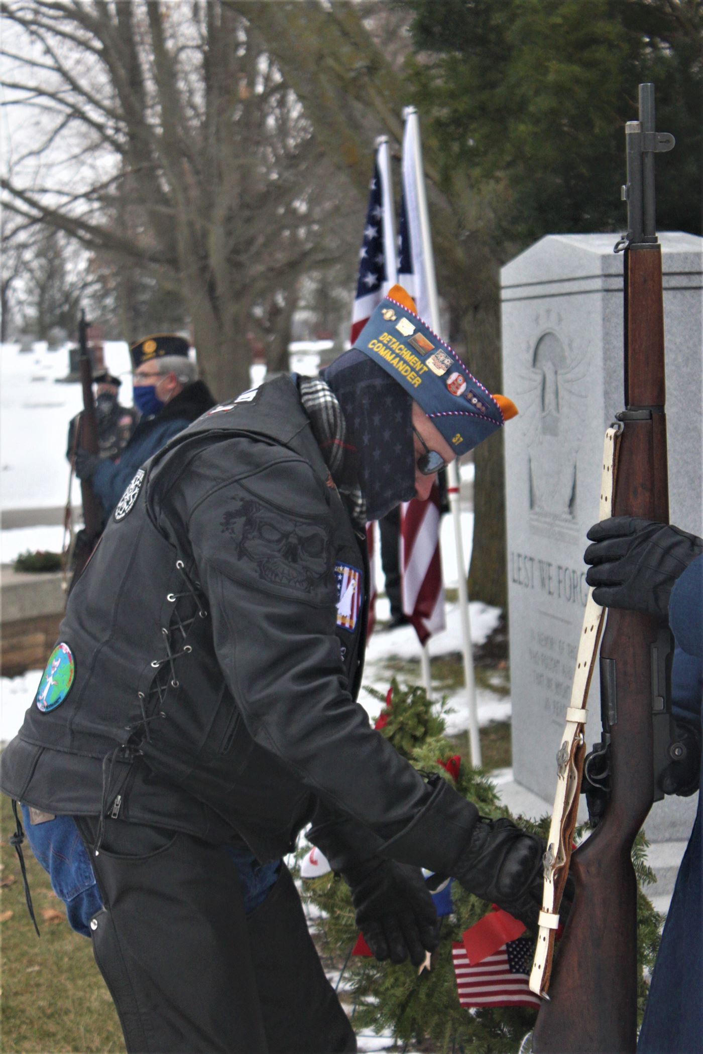 Sons of the Am. Legion Iowa Detachment commander Mike Monserud presents the US Navy Wreath