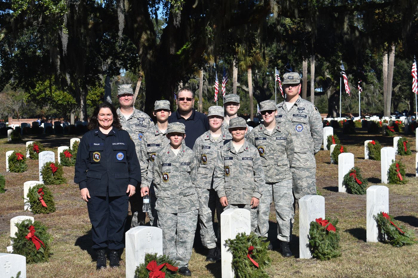 At the end of the morning, 10 cadets and senior members (plus two cadets not pictured) grab a photo before leaving the Beaufort National Cemetery.