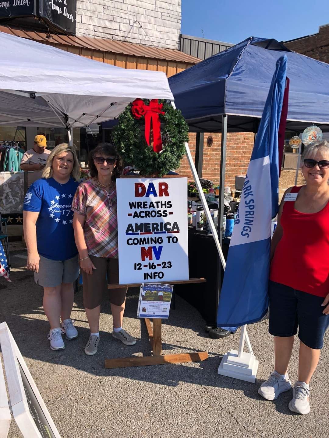 Ozark Spring Chapter Daughter of the American Revolution selling raffle tickets at Pioneer Days in Mtn. View, Missouri for 2023 Wreaths Across America<br>