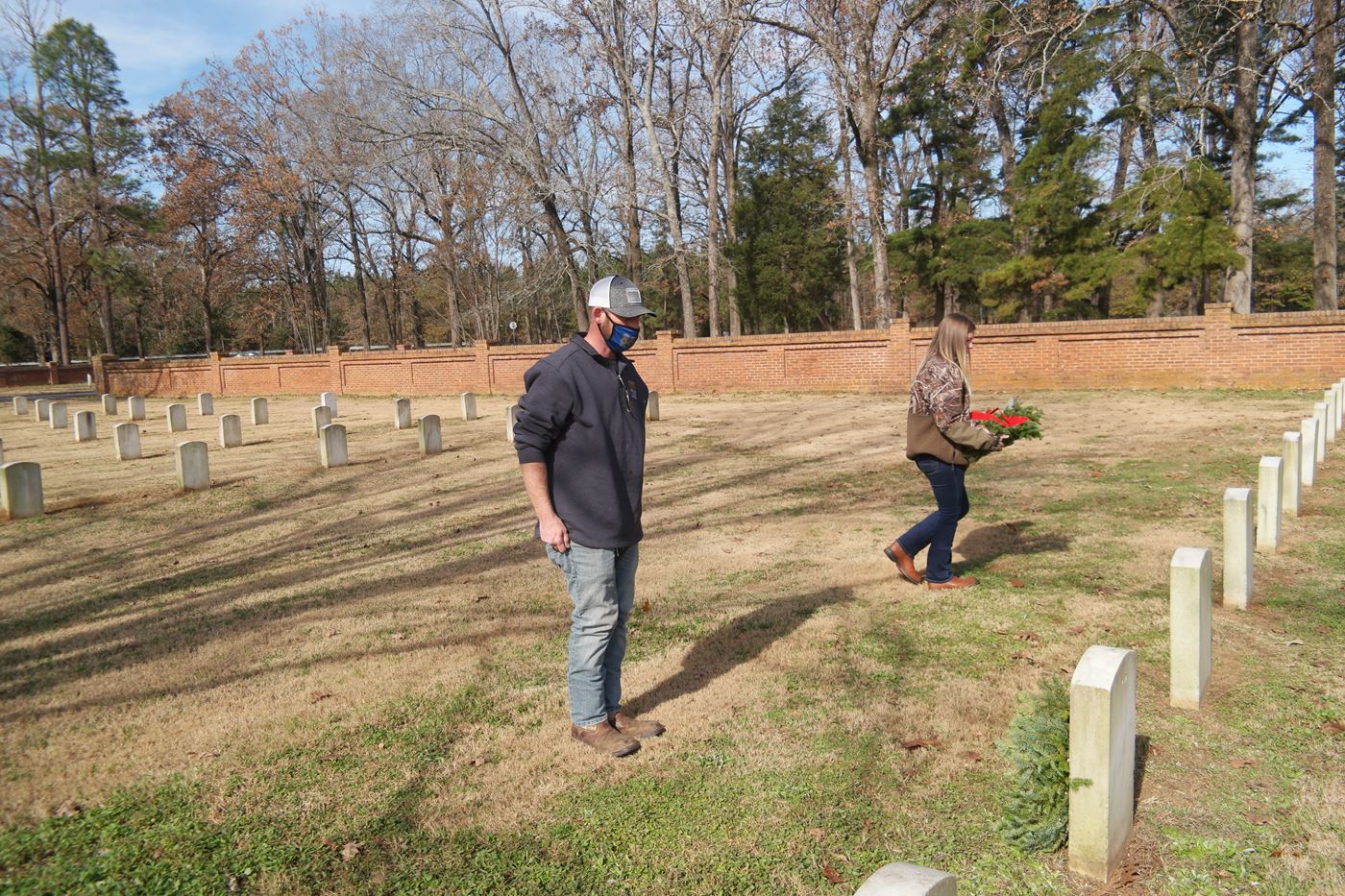 Johnathan Kreutzer Salutes a Fallen Veteran During National Wreaths Across America Day