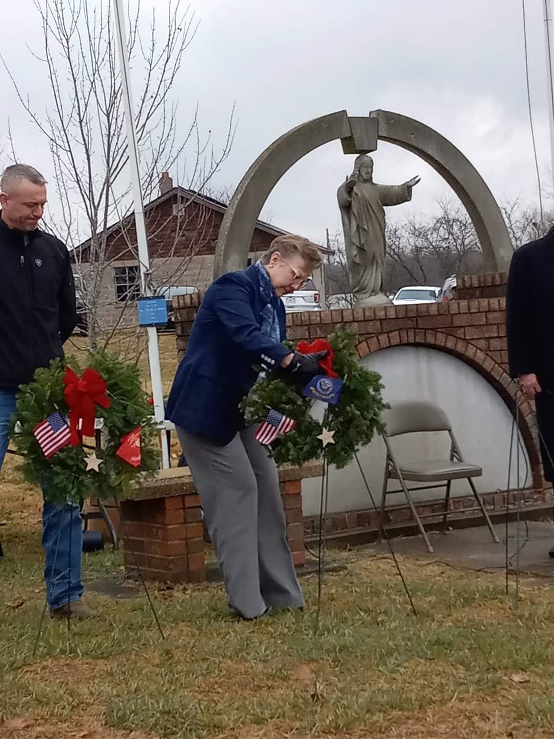 United States Navy Veteran, Lia Griffin, Eminence, Missouri places their Ceremonial Wreath<br>