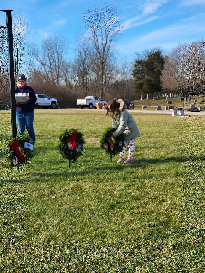 Vivian Albaugh presenting the Prisoners of War or Missing in Action wreath.