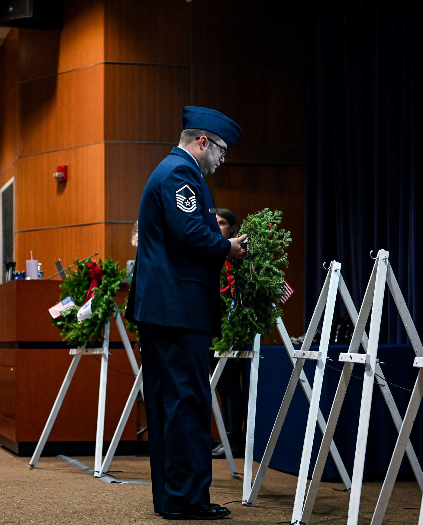 MSgt Patrick Crudden places the veteran's wreath in memory of those who served and are serving in the United States Air Force.&nbsp;&nbsp;