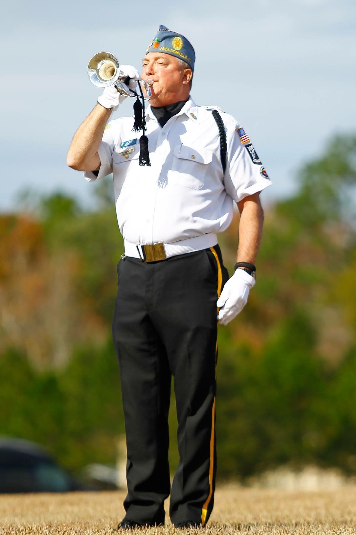 Troop 522 Scoutmaster Jim Steele Sounding Taps for the 2018 WAA Day ceremonies at JNC