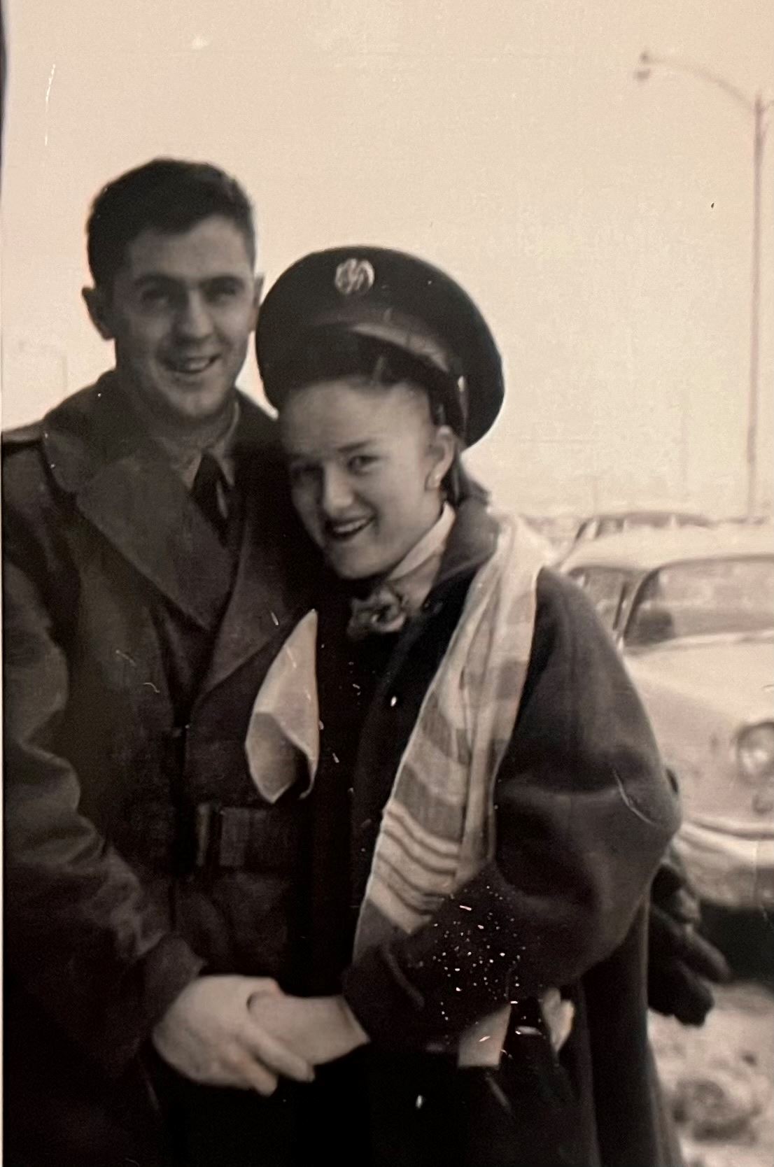 <i class="material-icons" data-template="memories-icon">chat_bubble</i><br/>John M Burke<br/><div class='remember-wall-long-description'>Our Dad and hero, Jack Burke, beloved and missed greatly. Picture is taken with his new bride, Florence, saying goodbye at the airport on his way to Berlin.</div><a class='btn btn-primary btn-sm mt-2 remember-wall-toggle-long-description' onclick='initRememberWallToggleLongDescriptionBtn(this)'>Learn more</a>