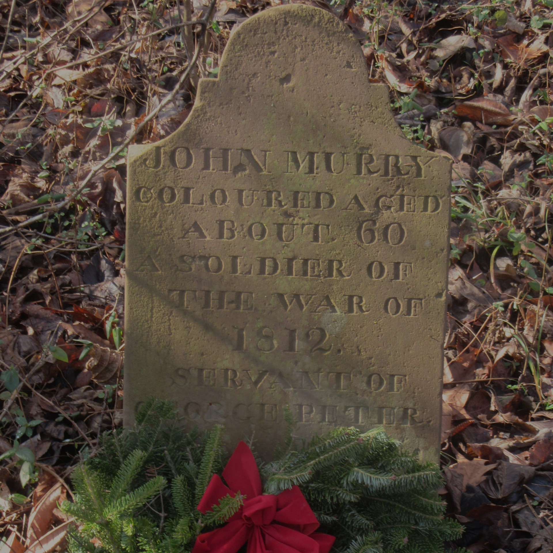 <i class="material-icons" data-template="memories-icon">chat_bubble</i><br/>John Murry, <br/>Posted by: William Gooch<br/><div class='remember-wall-long-description'>Grave of African American John Murry, soldier from the War of 1812, located in the woods not far from DPC here in Maryland. What makes this grave historically significant is that despite his position as a slave, Mr. Murry received a full headstone for his burial. It is believed he past in the 1840'sHidden Slave Grave</div><a class='btn btn-primary btn-sm mt-2 remember-wall-toggle-long-description' onclick='initRememberWallToggleLongDescriptionBtn(this)'>Learn more</a>