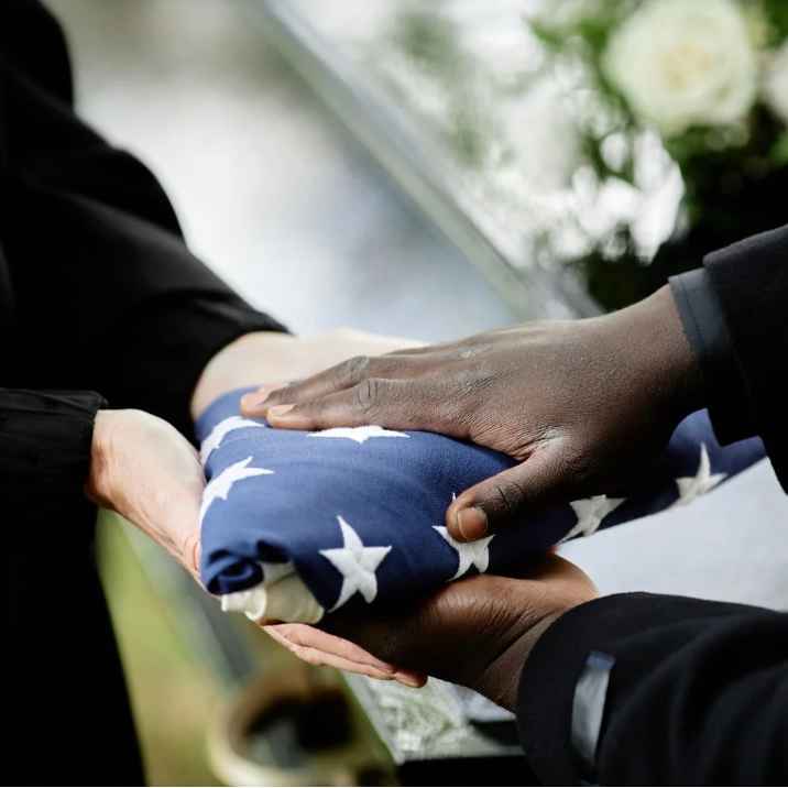 <i class="material-icons" data-template="memories-icon">chat_bubble</i><br/>The Veterans we have been privileged to serve, <br/>Posted by: Scanlan's Funeral Home<br/><div class='remember-wall-long-description'>In honor of the veterans we have been privileged to serve, Scanlan’s places these wreaths with deepest gratitude for their service to our nation. It has been our profound honor to walk alongside their families in remembrance and care.</div><a class='btn btn-primary btn-sm mt-2 remember-wall-toggle-long-description' onclick='initRememberWallToggleLongDescriptionBtn(this)'>Learn more</a>